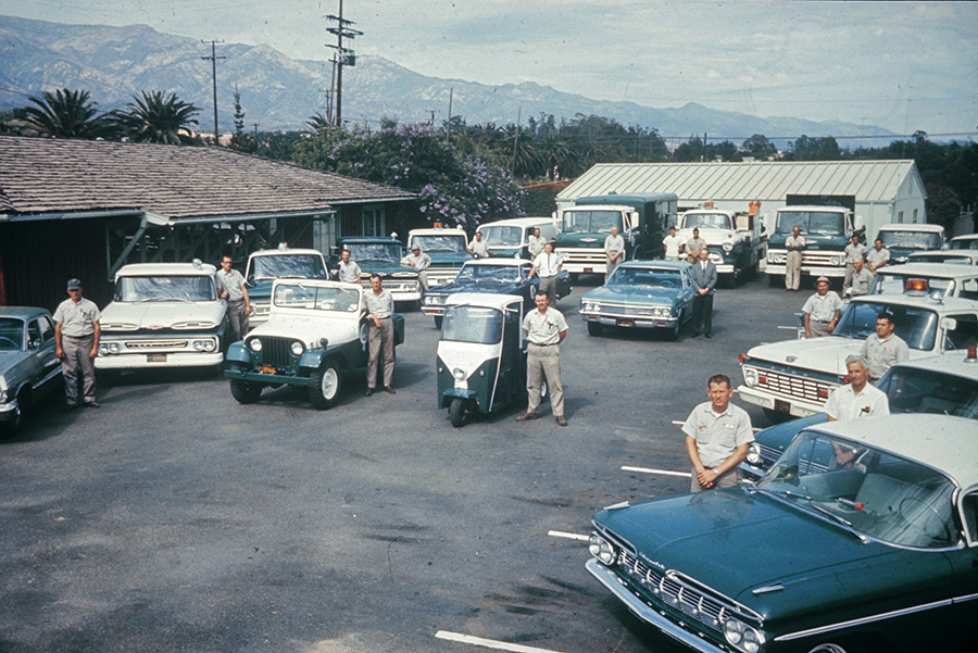 District Yard with Staff and Vehicles